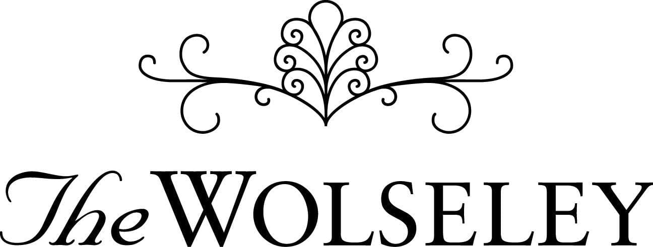 The Wolseley logo features ornate black scrollwork above the words "The Wolseley" in elegant, serif and script fonts on a white background.